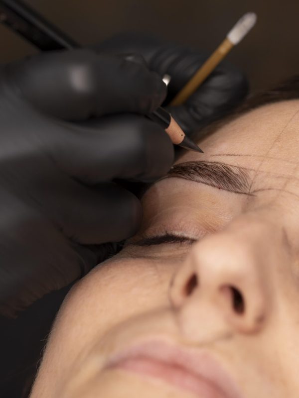 woman-going-through-microblading-treatment